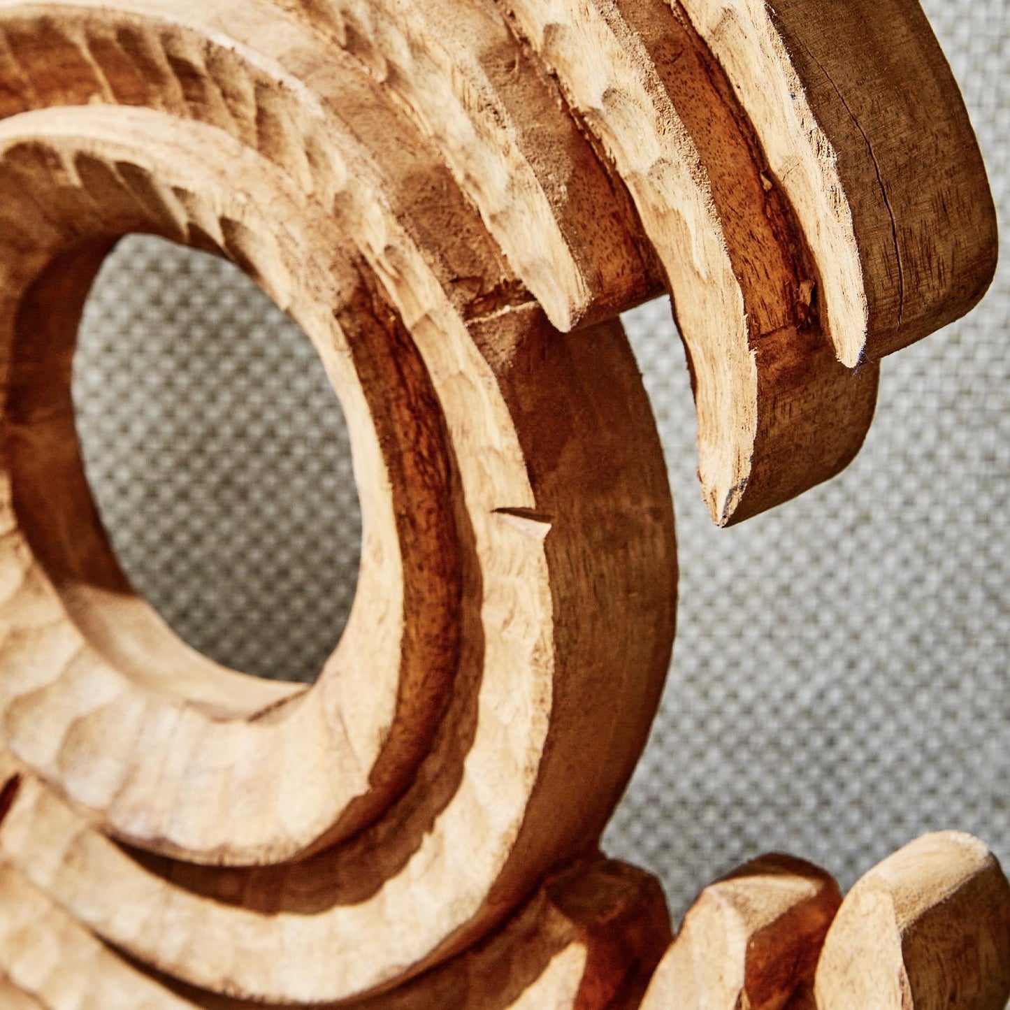 Hand Carved Wood Sculpture on Black Stand